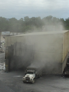 Haul roads, loading and unloading areas, and stockpiles are major contributors to secondary dust. 