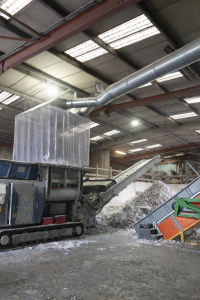 Adding additional PVC curtain strips to the shredder dust extraction capture hood serves two purposes; firstly to help contain any airborne dust particles within this enclosure and secondary to enable manual loading of the shredder hopper.