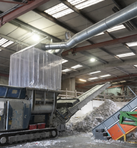 Adding additional PVC curtain strips to the shredder dust extraction capture hood serves two purposes; firstly to help contain any airborne dust particles within this enclosure and secondary to enable manual loading of the shredder hopper.