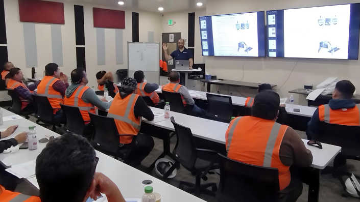 In house Baghouse Maintenance vs. Baghouse.com PM Program A maintenance team is receiving a class from a professional preventive maintenance specialist to evaluate equipment condition, identify developing problems, and support reliable baghouse operation.